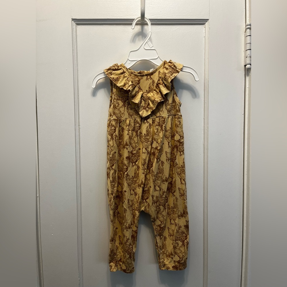 Kate Quinn sleeveless onesie w ruffles